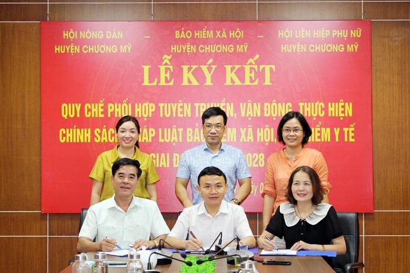 Bảo hiểm xã hội và Hội LHPN huyện Chương Mỹ ký kết phối hợp tuyên truyền - ảnh 1