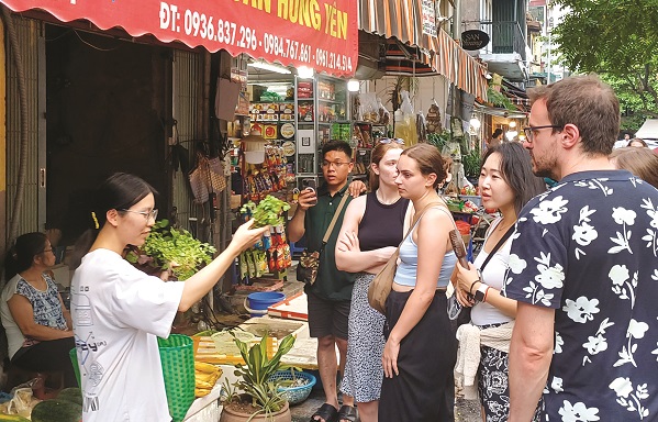 Chợ Hà Nội - điểm đến khám phá của nhiều du khách - ảnh 2