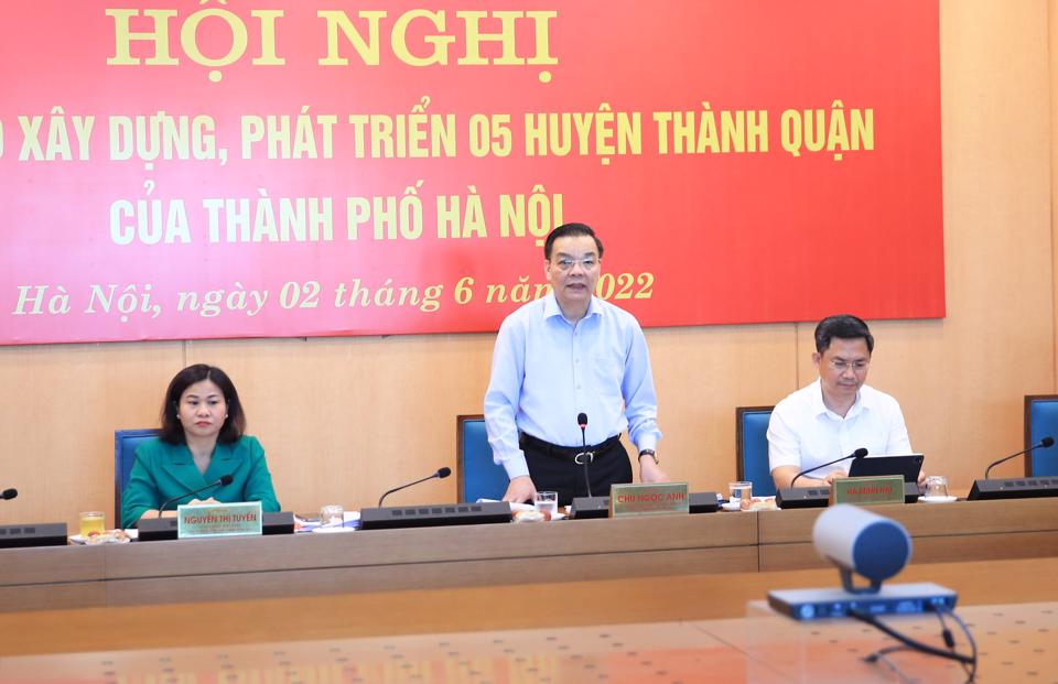 Quyết tâm thực hiện lộ trình xây dựng 5 huyện thành quận - ảnh 1