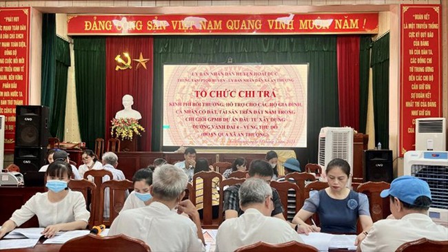Dự án đường Vành đai 4: Hoài Đức tiếp tục chi trả tiền bồi thường cho người dân - ảnh 1