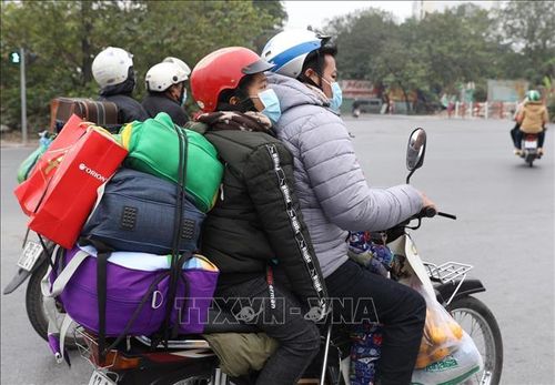 Đông đúc cảnh người dân trở lại Hà Nội sau kỳ nghỉ Tết Nguyên đán - ảnh 6