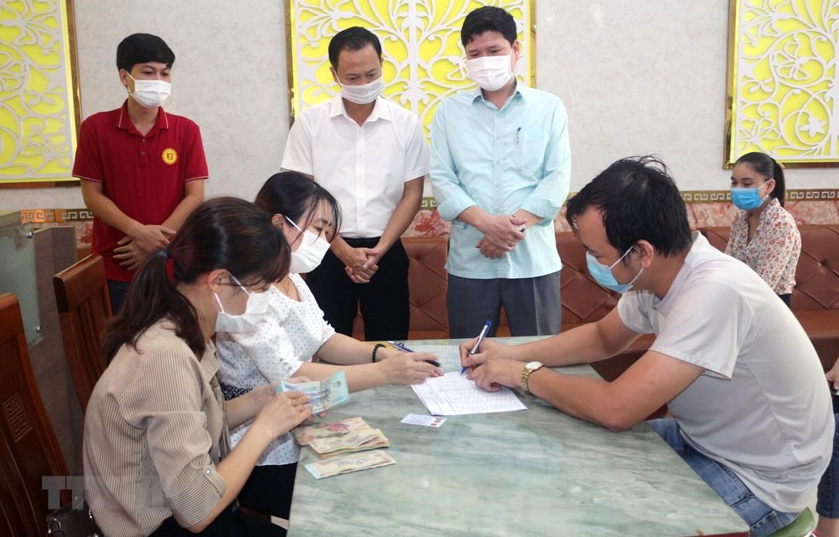 Bộ Lao động - Thương binh và Xã hội yêu cầu giải ngân chậm nhất trước ngày 30/8 - ảnh 1