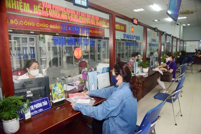Hà Nội triển khai quy trình liên thông điện tử đối với 2 nhóm thủ tục hành chính thiết yếu - ảnh 1