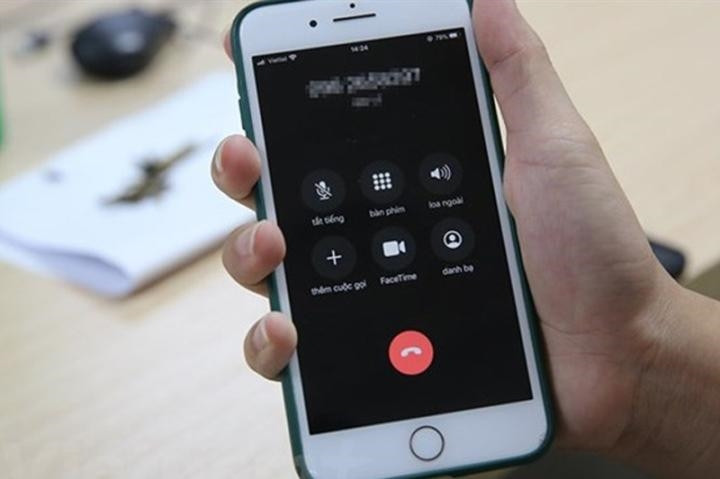 Sau cuộc điện thoại lừa đảo, người phụ nữ ở Hà Nội mất gần 100 triệu đồng - ảnh 1