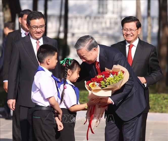 Lễ đón trọng thể Tổng Bí thư Tô Lâm tại thủ đô Viêng Chăn (Lào) - ảnh 1