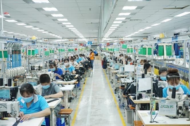 Sớm công bố mức sống tối thiểu hàng năm làm căn cứ tính lương tối thiếu - ảnh 1