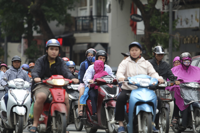 Thời tiết ngày 27/3: Bắc Bộ mưa rào, trời rét, Nam Bộ nắng nóng - ảnh 1