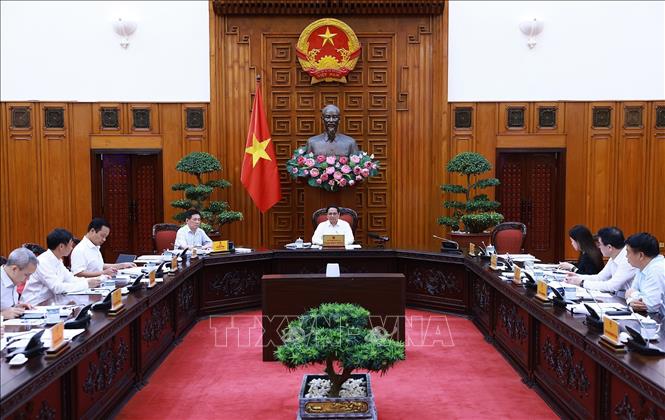 Thủ tướng Phạm Minh Chính: Toàn xã hội chung tay ứng phó, khắc phục hậu quả bão lụt - ảnh 1