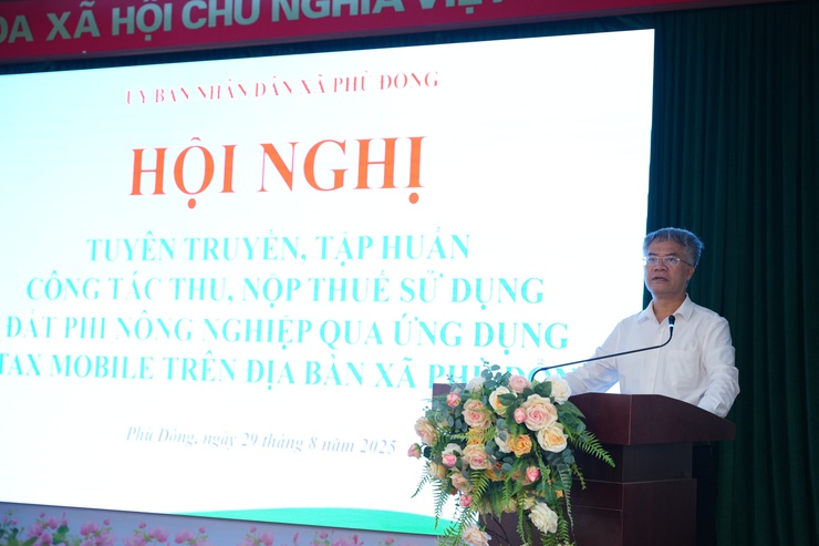 UBND xã Phù Đổng: Ứng dụng công nghệ trong công tác thu nộp thuế sử dụng thuế đất phi nông nghiệp năm 2025 - ảnh 1