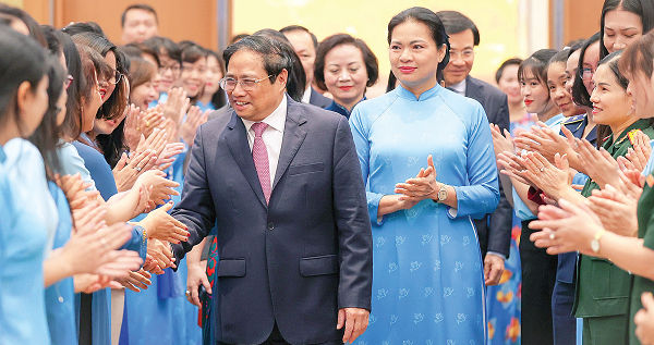 Phát huy vai trò, đóng góp của phụ nữ vào sự phát triển chung của đất nước - ảnh 1