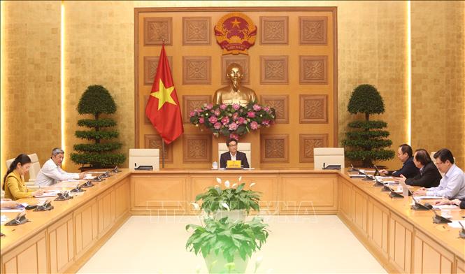 Ph&oacute; Thủ tướng Vũ Đức Đam chủ tr&igrave; cuộc họp. Ảnh: Dương Giang/TTXVN