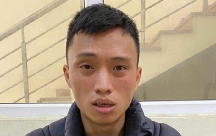 Đối tượng Qu&aacute;ch Văn Nam tại cơ quan c&ocirc;ng an.