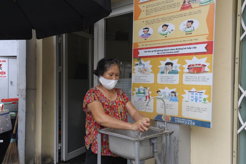 Tăng cường phòng chống dịch Covid-19 ở chợ đầu mối lớn nhất Thủ đô - ảnh 3