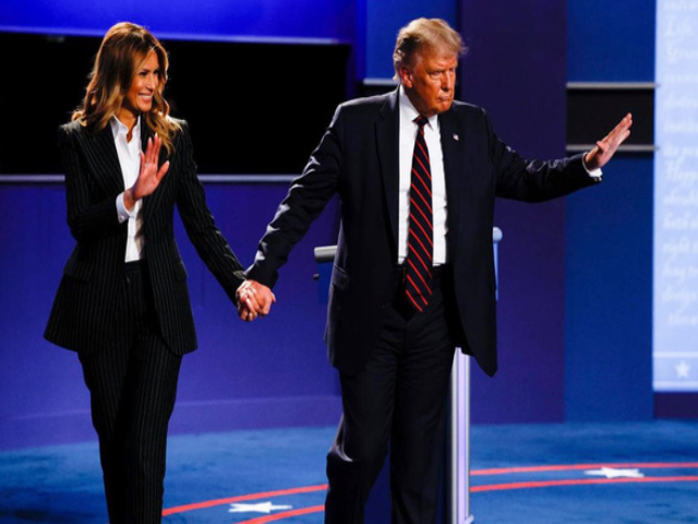 Tổng thống Donald Trump và đệ nhất phu nhân Melania Trump tại cuộc tranh luận tổng thống đầu tiên ngày 29-9 - Ảnh: REUTERS