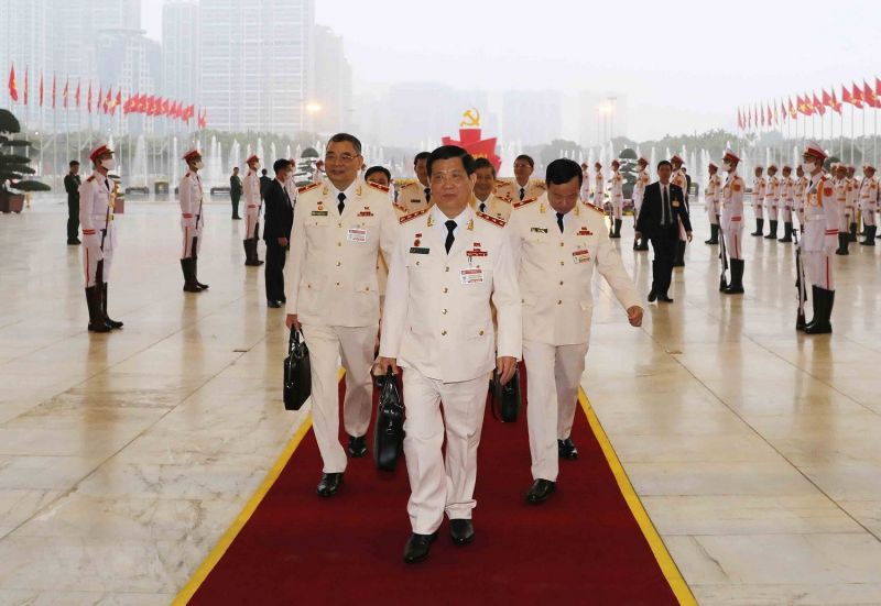 Các đại biểu Đoàn Đảng bộ Công an Trung ương đến dự phiên họp trù bị. (Ảnh: TTXVN)