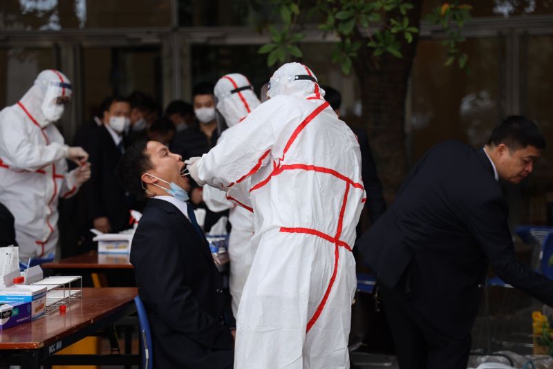 Xét nghiệm COVID-19 cho phóng viên báo chí và lực lượng an ninh phục vụ Đại hội Đảng XIII - ảnh 1