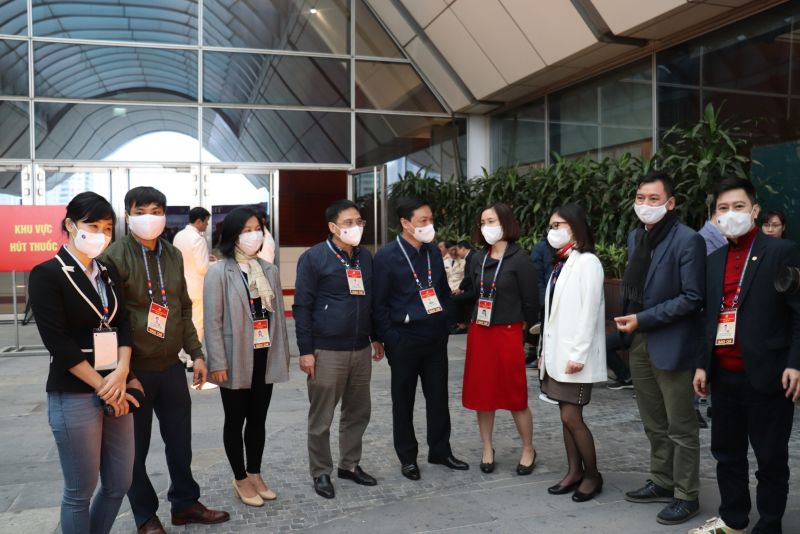 Phóng viên tại Đại hội Đảng XIII thực hiện nghiêm biện pháp phòng, chống dịch - ảnh 4