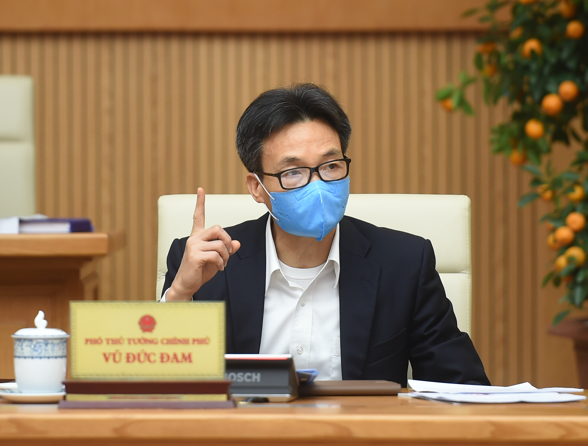 Phó Thủ tướng Chính phủ Vũ Đức Đam, Trưởng Ban Chỉ đạo quốc gia phòng chống dịch COVID-19 phát biểu tại cuộc họp.