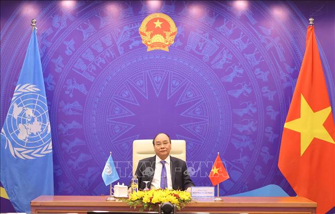 Thủ tướng Chính phủ Nguyễn Xuân Phúc phát biểu tại điểm cầu Hà Nội. Ảnh: Thống Nhất/TTXVN