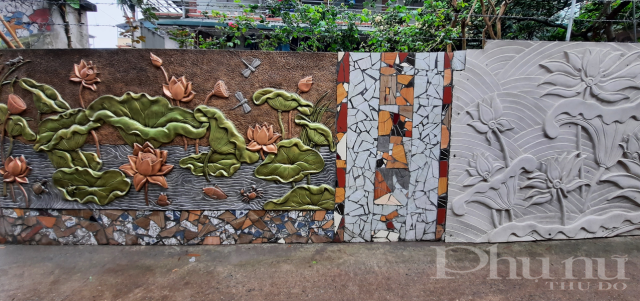 Phải mất hàng tháng trời các chị em phụ nữ chi hội Hoàng Liên 2 mới hoàn thành những bức bích hoạ trên tường độc đáo này.