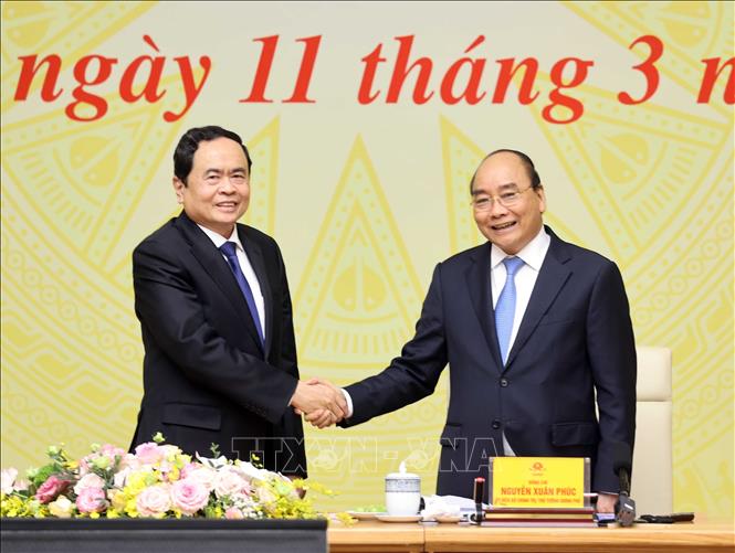 Thủ tướng Chính phủ Nguyễn Xuân Phúc và Chủ tịch Ủy ban Trung ương Mặt trận Tổ quốc Việt Nam Trần Thanh Mẫn dự hội nghị. Ảnh: Thống Nhất/TTXVN
