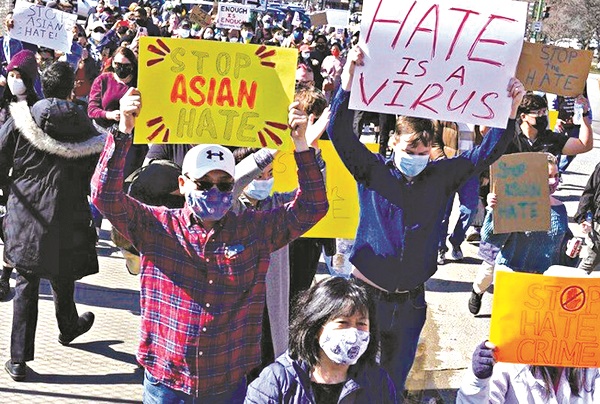 Người dân Mỹ cầm biểu ngữ  Người dân Mỹ cầm biểu ngữ