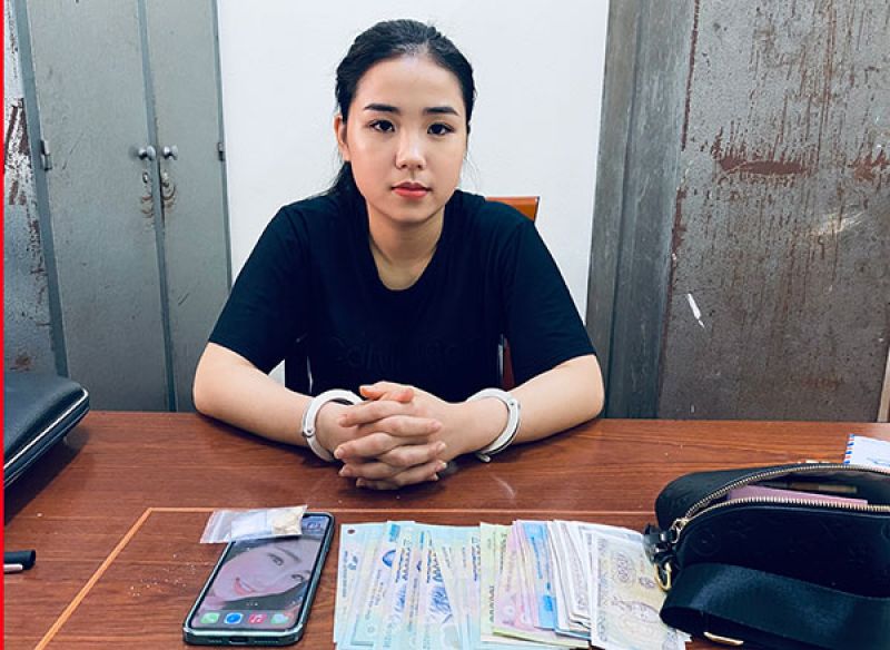 Đối tượng Trần Thị Diệu Huyền tại cơ quan công an.