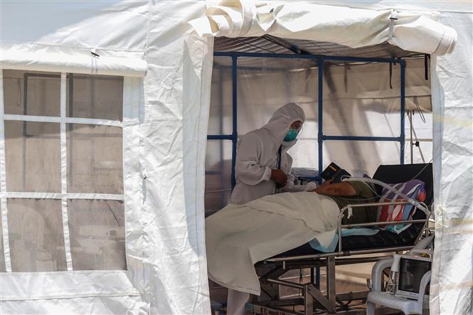 Khu vực điều trị cho bệnh nh&acirc;n nhiễm COVID-19 tại Manila, Philippines. Ảnh: AFP/TTXVN