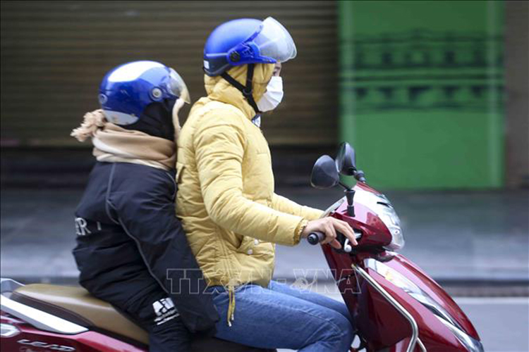 Bắc Bộ trời rét, vùng núi có nơi rét đậm. Ảnh: TTXVN