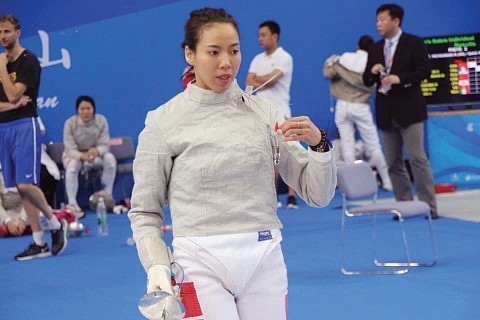 Lệ Dung trong một giải thi đấu quốc tế.