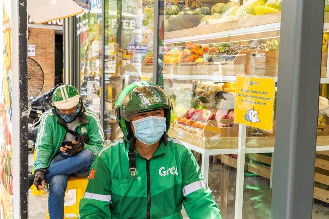 Hà Nội cho phép xe ôm công nghệ được hoạt động trở lại từ 8-2 - ảnh 1