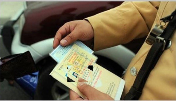Từ 1/6, cho người khác mượn giấy phép lái xe sẽ bị thu hồi  - ảnh 1