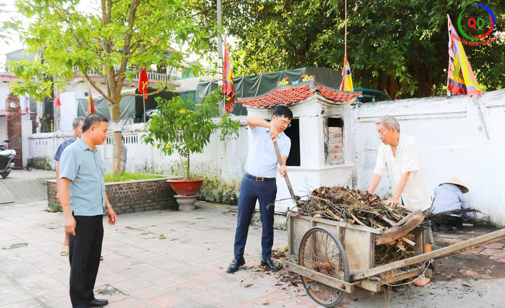 Xã Quốc Oai: Đồng loạt ra quân tổng vệ sinh môi trường - ảnh 11