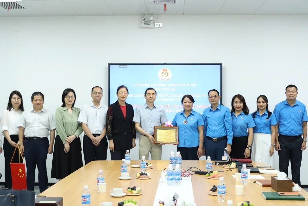 Liên đoàn Lao động thành phố Hà Nội tiếp Đoàn đại biểu Tổng Công hội Trung Quốc - ảnh 1
