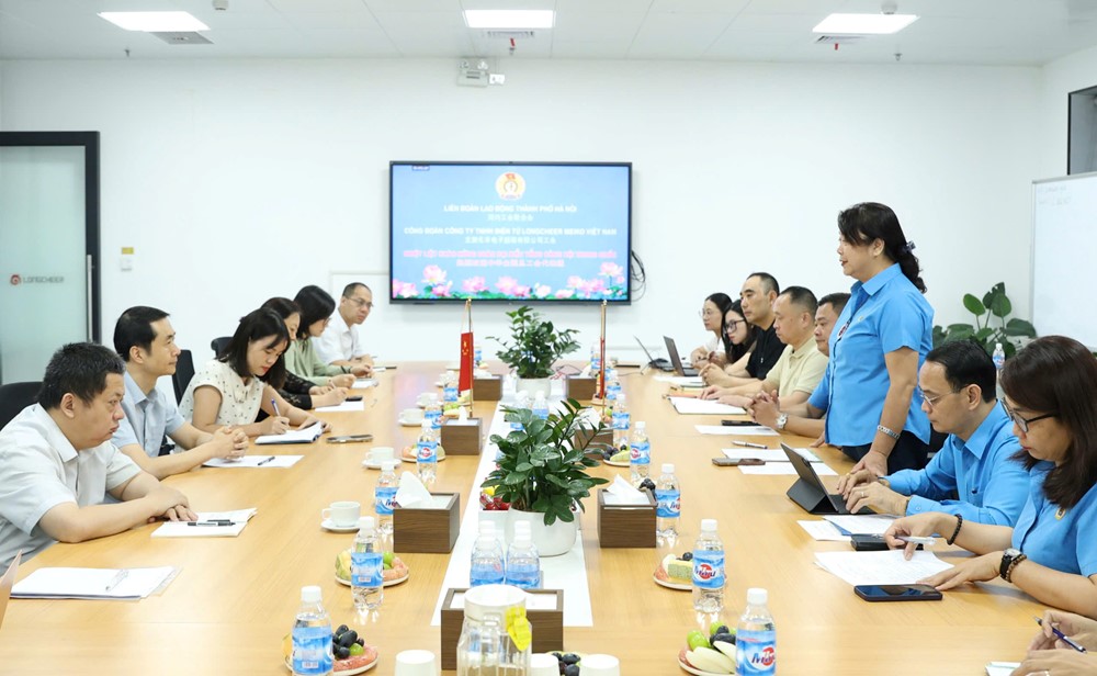 Liên đoàn Lao động thành phố Hà Nội tiếp Đoàn đại biểu Tổng Công hội Trung Quốc - ảnh 2