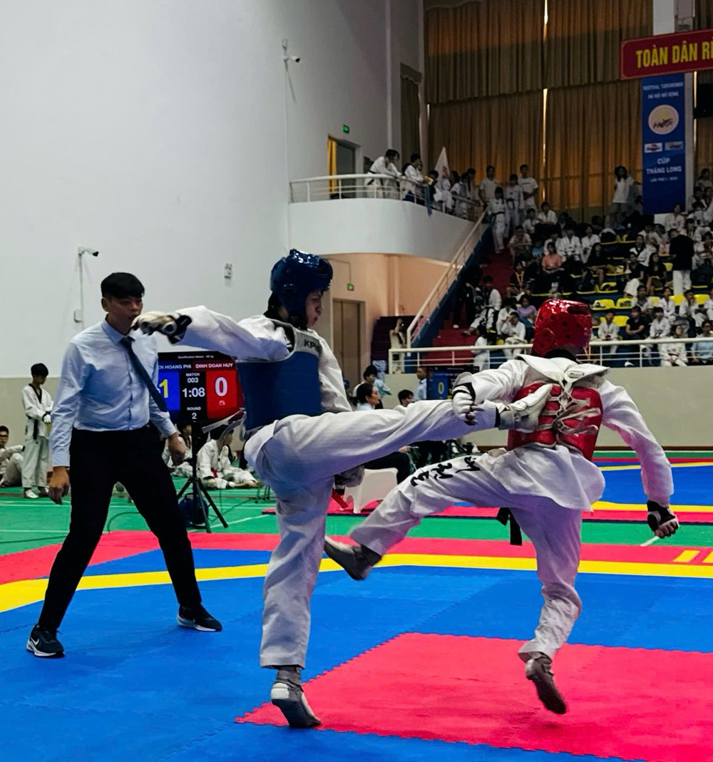 Hơn 1.000 võ sĩ tham dự Festival Taekwondo Hà Nội mở rộng - Cúp Thăng Long Lần thứ 1 năm 2025 - ảnh 1