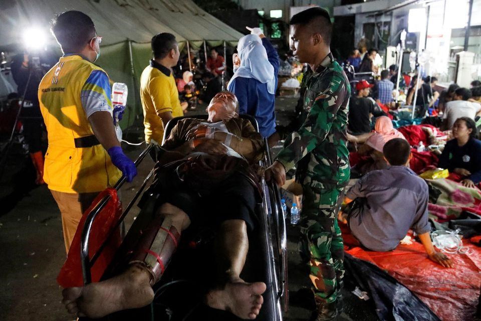 Indonesia chạy đua tìm kiếm nạn nhân động đất - ảnh 2