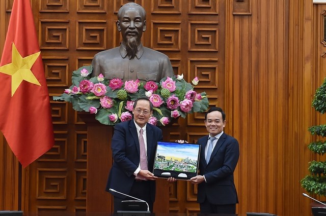 Phó Thủ tướng Trần Lưu Quang tiếp Bộ trưởng thứ hai Bộ Công Thương Singapore- Ảnh 2.