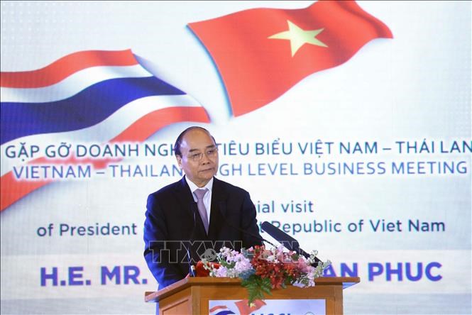 Chủ tịch nước Nguyễn Xuân Phúc gặp gỡ doanh nghiệp tiêu biểu Việt Nam - Thái Lan - ảnh 1