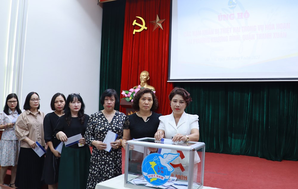 Hội LHPN Hà Nội tưởng niệm và phát động ủng hộ các nạn nhân trong vụ hỏa hoạn tại quận Thanh Xuân - ảnh 7