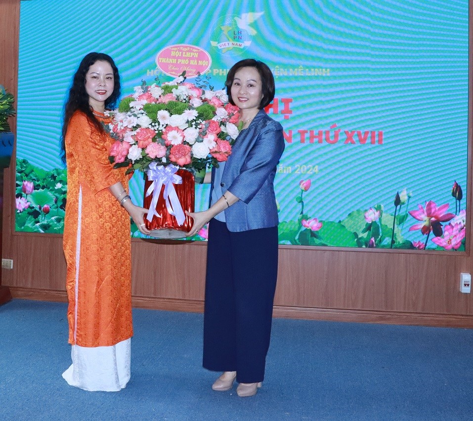 Bà Trần Thị Lan được bầu giữ chức vụ Chủ tịch Hội LHPN huyện Mê Linh - ảnh 2