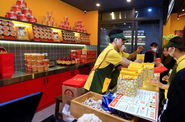 Thị trường tiêu thụ đồ ăn nhẹ Việt Nam tăng trưởng nhanh  - ảnh 1