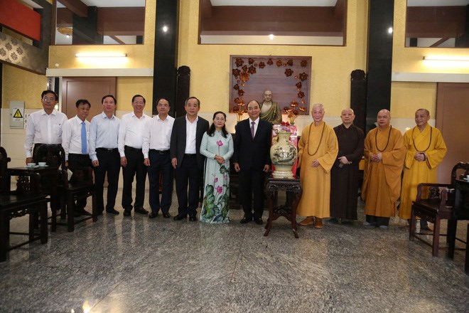 Chủ tịch nước Nguyễn Xuân Phúc thăm, chúc Tết Giáo hội Phật giáo Việt Nam - ảnh 1