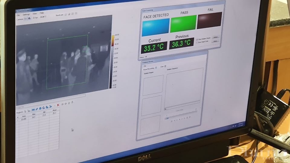 Hình ảnh máy đo thân nhiệt cho du khách tại sân bay Nội Bài