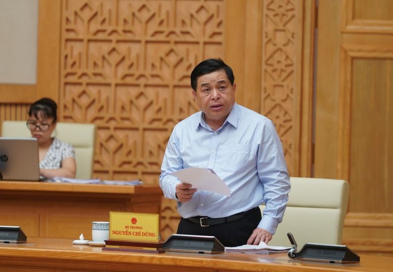 Bộ trưởng Bộ Kế hoạch và Đầu tư Nguyễn Chí Dũng phát biểu tại phiên họp. - Ảnh: VGP/Quang Hiếu