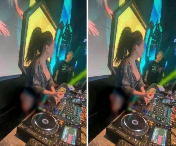 DJ Ngân 98 ăn mặc phản cảm ở quán bar trong buổi biểu diễn ngày 23/7 (nguồn ảnh internet)