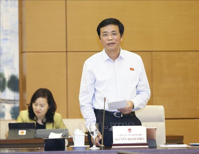 Tổng Thư ký Quốc hội Nguyễn Hạnh Phúc phát biểu ý kiến. Ảnh: Doãn Tấn/TTXVN