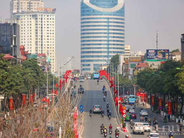 Hà Nội rực cờ hoa chào mừng Đại hội Đảng lần thứ XIII - ảnh 6