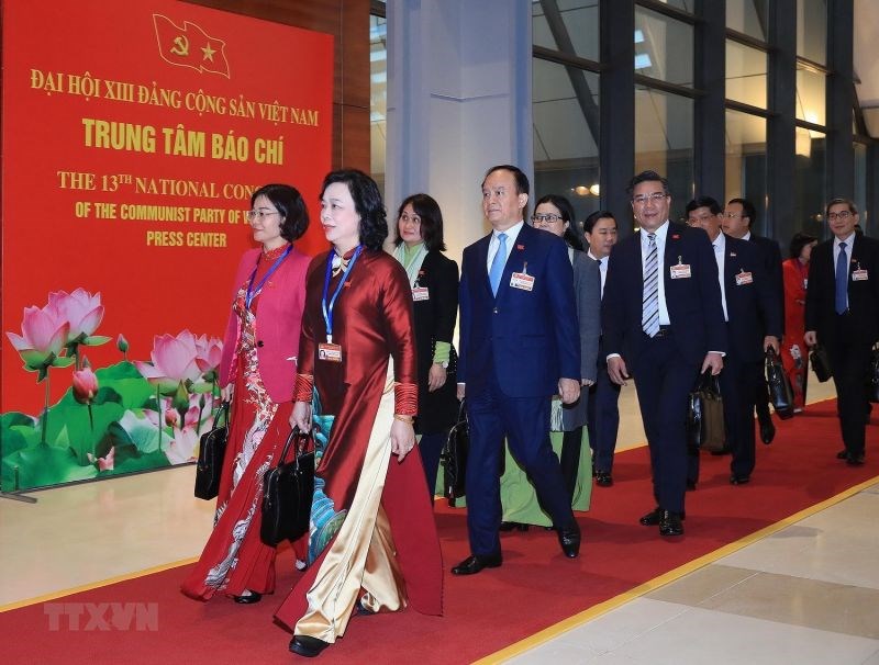 Đoàn đại biểu Đảng bộ Thành phố Hà Nội đến dự phiên họp trù bị Đại hội XIII của Đảng. (Ảnh: TTXVN)