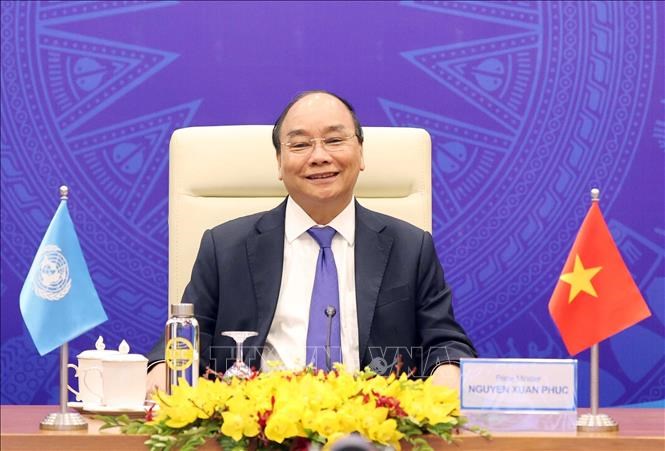 Thủ tướng Chính phủ Nguyễn Xuân Phúc phát biểu tại điểm cầu Hà Nội. Ảnh: Thống Nhất/TTXVN